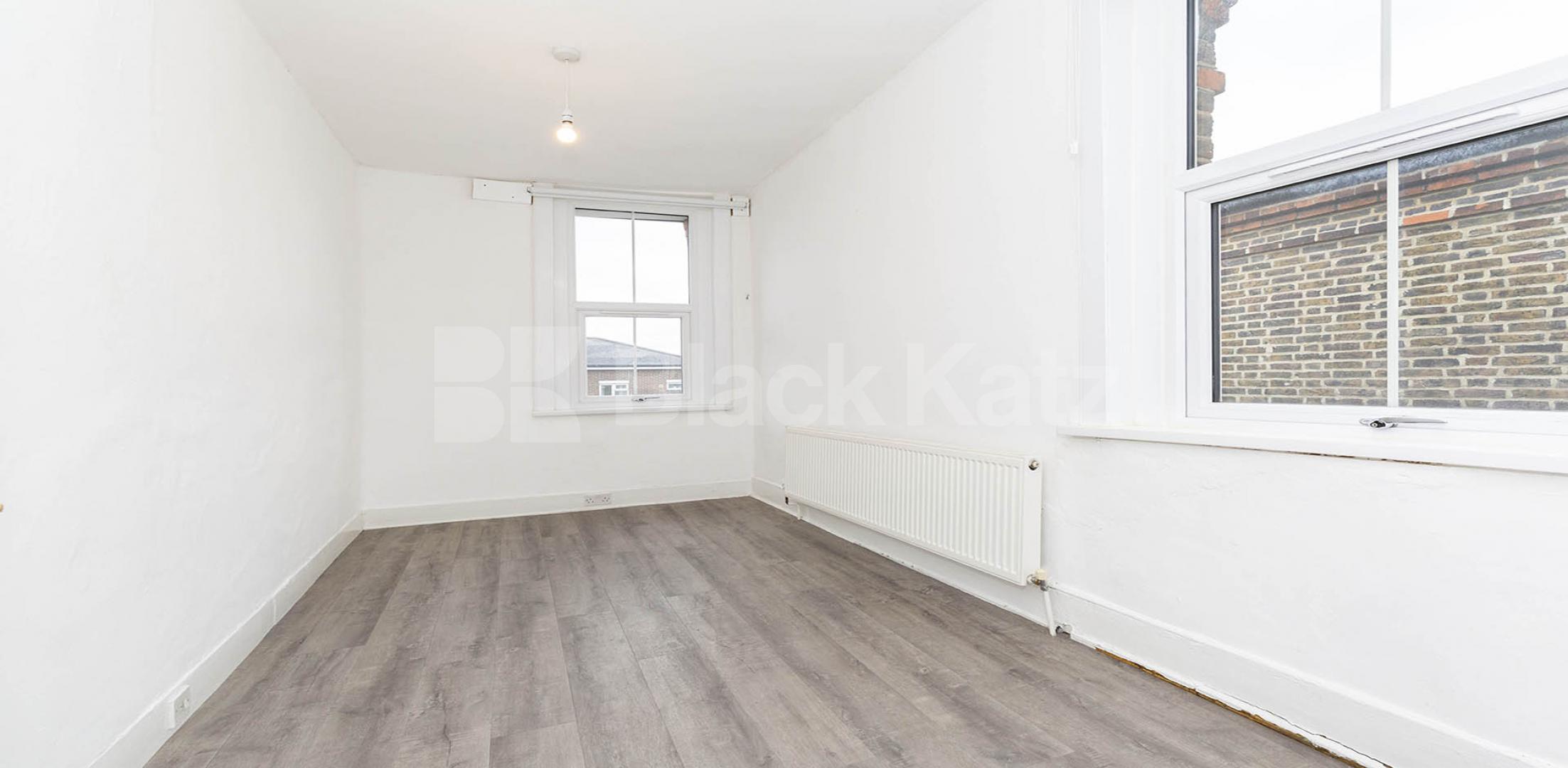 Split over two floors a large 3 bedroom apartment with kitchen diner Hungerford Road, Hillmarton Conservation Area 